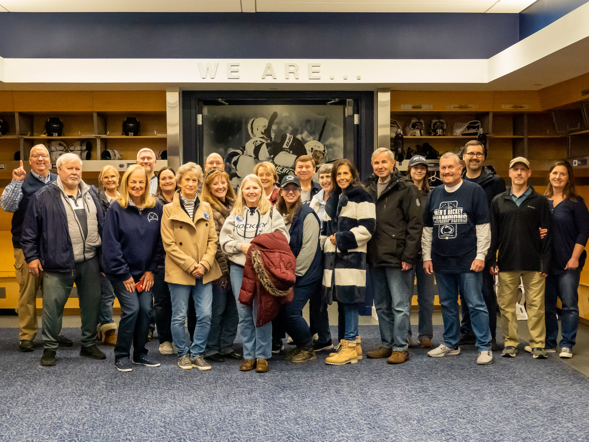Members in the home dressing room during a supporters' tour of Pegula Ice Arena
